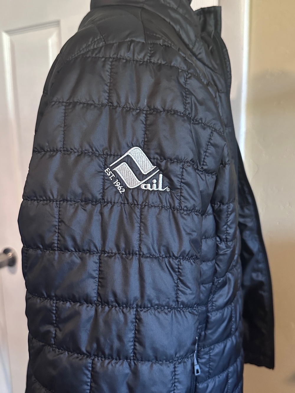 Patagonia Women's Black Quilted Puffer Jacket with Vail logo on sleeve. - Picture 3 of 5